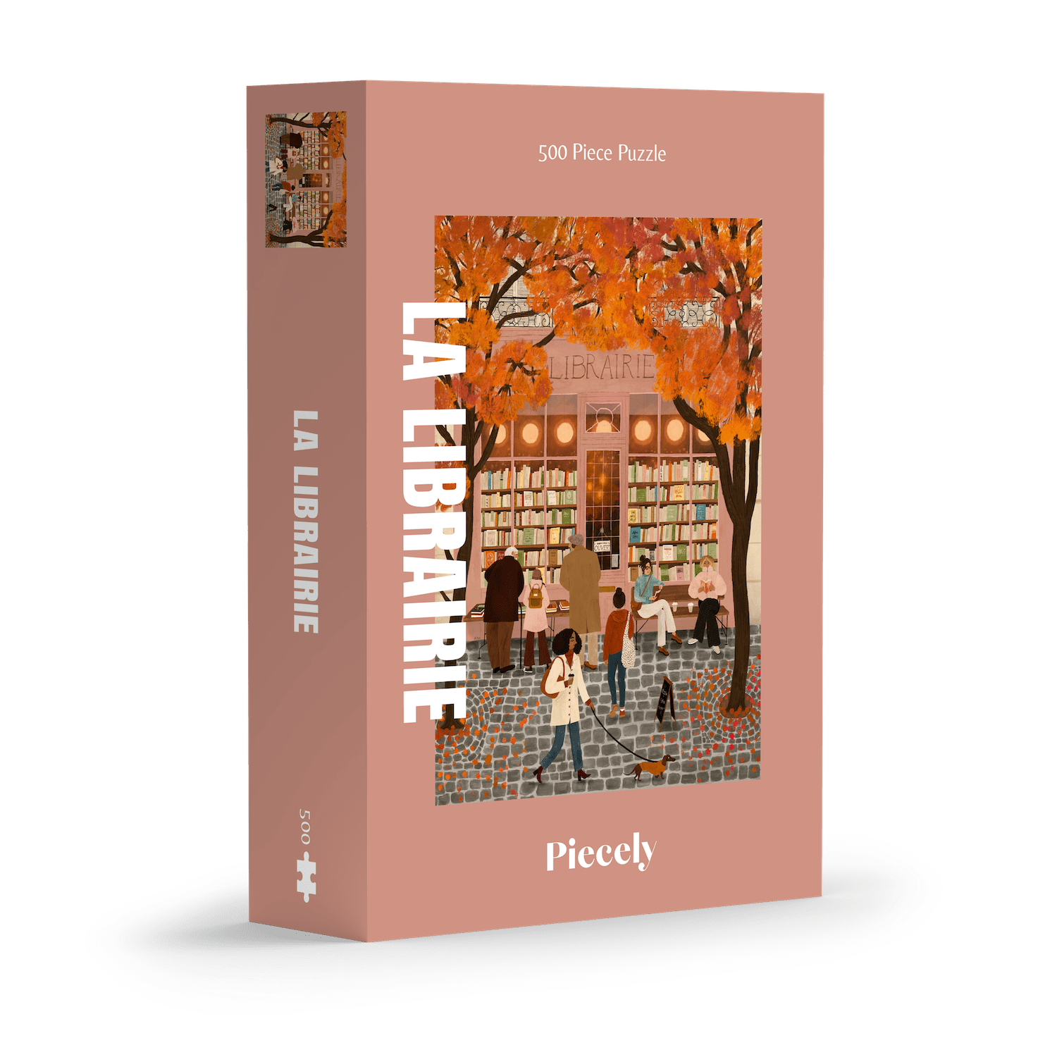 500-Teile-Puzzle „La Librairie“ von Piecely – Illustration einer herbstlichen Pariser Straßenszene vor einer kleinen Buchhandlung, auf rosa-brauner Verpackung.