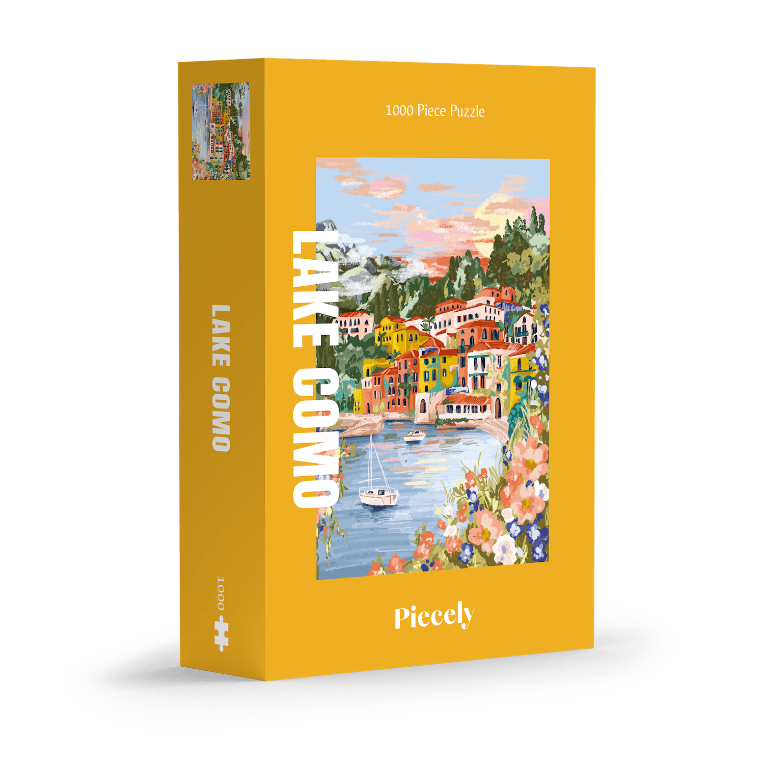 Die Verpackung des 1000-teiligen Puzzles „Lake Como“ von Piecely ist sonnengelb. Die Illustration zeigt den italienischen Ort Varenna am Comer See mit bunten Häusern am Ufer, grünen Hügeln und kleinen Segelbooten im Wasser. Im Vordergrund blühen bunte Blumen. Der Titel „LAKE COMO“ steht groß und weiß vertikal am linken Rand der Vorderseite.