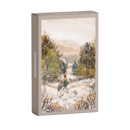 99-Teile-Mini-Puzzle „Homecoming“ von Piecely – Illustration einer winterlichen Landschaft mit Frau, zwei Gänsen und Weihnachtsbaum, auf grauer Verpackung
