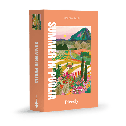 Außergewöhnliches 1000-Teile-Puzzle für Erwachsene, das die sommerliche Landschaft Apuliens in Italien zeigt. Zu sehen sind blühende Felder, Ein Berg und ein kleines Haus.