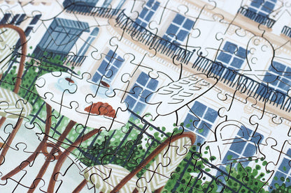 250-Teile-Holzpuzzle „Paris“ von Piecely – Illustration eines Pariser Balkons mit Frühstückstisch, Rosen und Eiffelturm im Hintergrund, von Ellen Gözel-Niehoff.